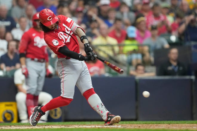 Jonathan India of the Cincinnati Reds hits an RBI single against the Milwaukee Brewers in the fourth inning at American Family Field on July 25, 2023.